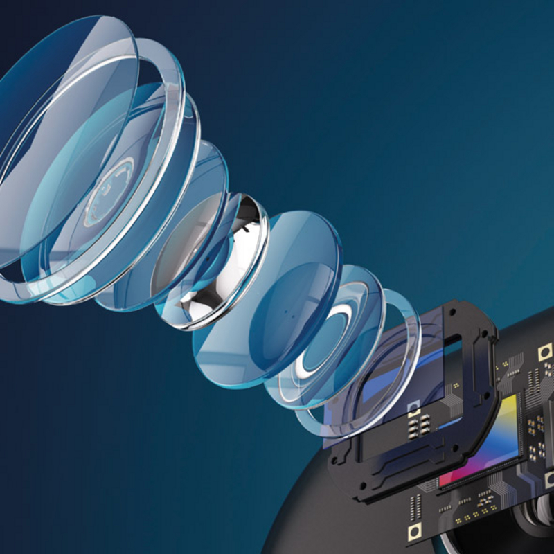 Kamera, deren Linse schematisch in die einzelnen Komponenten aufgespalten ist.